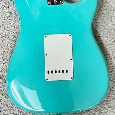 Mint Fender American Vintage II 1957 Seafoam Left Handed Stratocaster with Case image 8