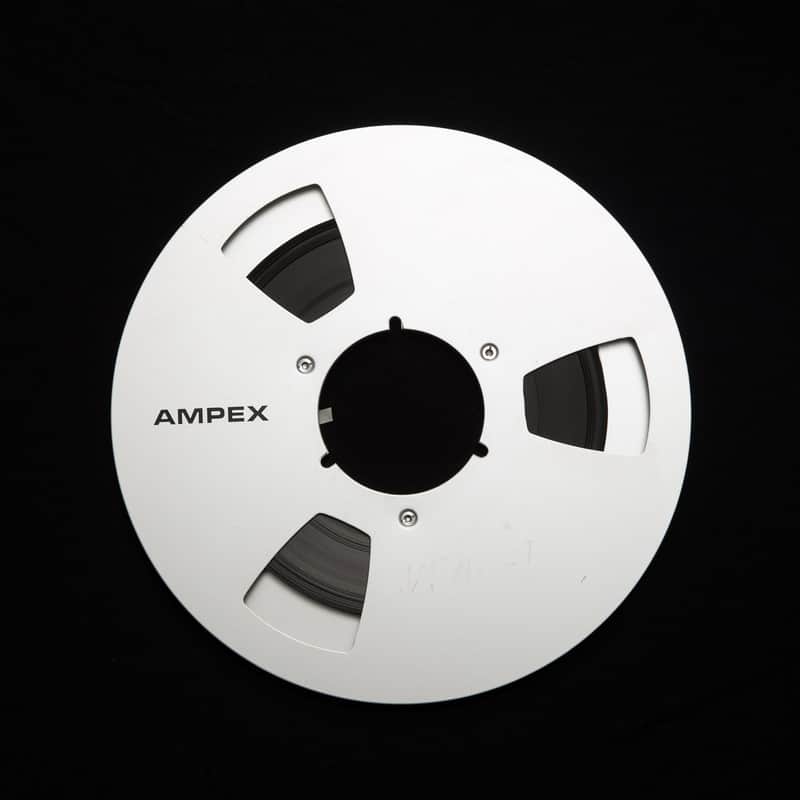 Ampex 10.5" Metal Reel (1980 - 1990) Brushed Aluminum, with random reel to reel 1/4" tape image 1