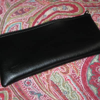 lightly used very clean 1980s Shure microphone pouch, outer areas are black vinyl with a very light reptile texture/appearance & one area has a red & silver graphic / inside is black / black zipper (NO microphone) 10 inches W, 4 & 1/2 inches H image 20