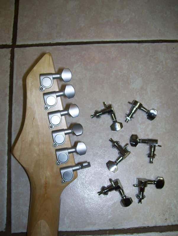 Guitar machine head or pegs, new. image 1