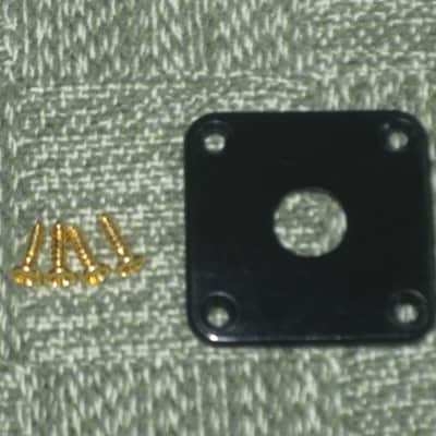 lightly used (lightly relic'd) genuine Gibson PRJP-010 Black Plastic Jack Plate for Les Paul + very clean gold screws (clean or used silver finish screws available upon request) [1990s - 2020s (specifically from 2008)] image 2