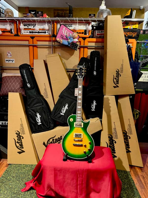 Vintage Guitars V100 30 ANNIVERSARY GREEN BURST W/ Bag image 1