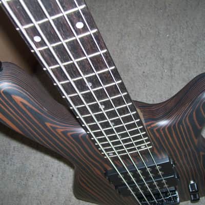 5 string bass guitar,  Zebra wood body. Active pickups. image 5