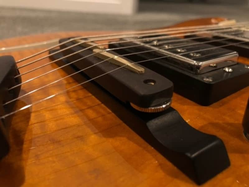 O. C. Guitars ebony wood bridge with brass saddles. equator and many other hollow bodies. image 1