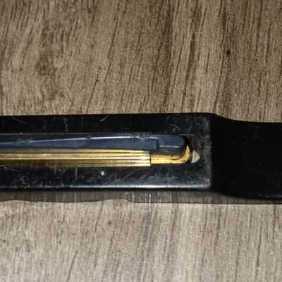 Guitar saddle Unusual Design - Plastic base. Metal insert image 8