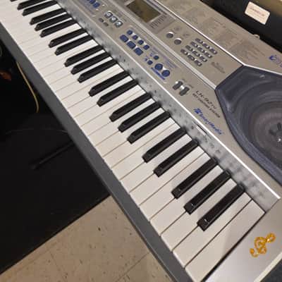 used Casio LK-92TV 61-Key Keyboard with Stand (missing music stand)