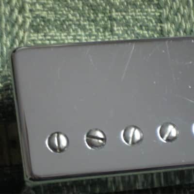used 2004 Ibanez Super 58 Bridge HB pickup, Chrome, Indonesia, Ceramic (7.82k) SP-58-R, the R stands for rear which is bridge (but can go in Neck position, Ibanez pickup modeled after PAF) 4 conductor +springs/screws, SP-58 image 11