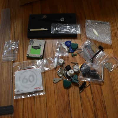 Mixed guitar and gear accessory lot, over 50 items, hardware , strings, tools, pickguards, ect. image 10