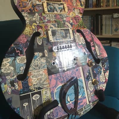 Old Antoria Guitar covered in 80's Sliver Surfer Comics, no pickups, worn frets. PROJECT image 1