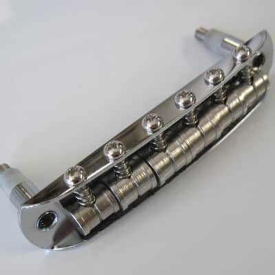 Fender USA Jaguar Jazzmaster Bridge with Mustang Saddles 7.25 Radius 7712971049