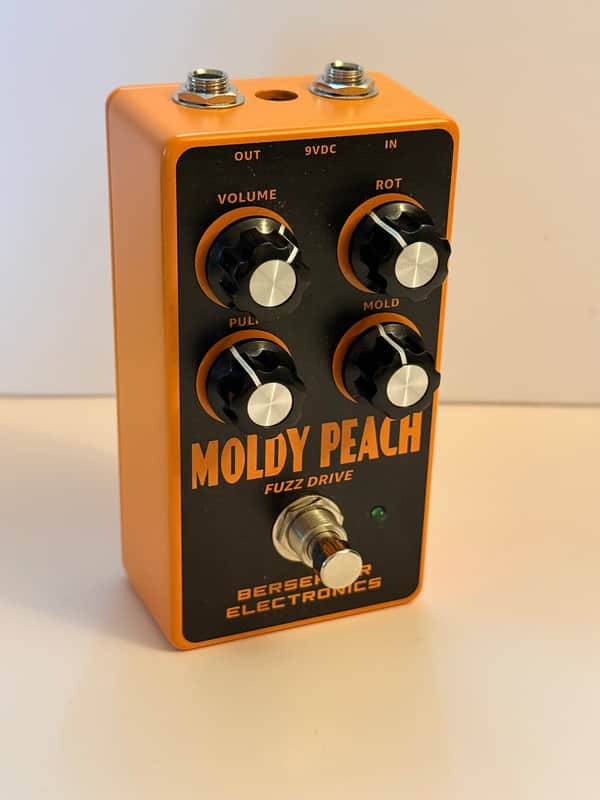 Berserker Electronics Molder Peach 2020’s - Black and orange image 1
