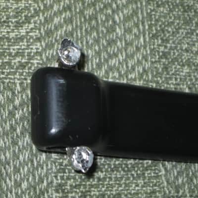 lite use (one mounting piece is broken) genuine Vox Black Plastic Dogbone Style Guitar Amplifier Handle with VOX logo and Diamond Pattern [Black hard - but flexible Plastic /  Metal Nickel mounting pieces (1 mounting piece is broken) + screws (from 2000) image 20