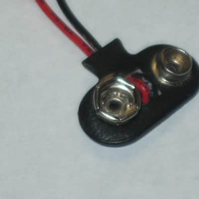 ONE very lightly used genuine Boss 9v battery clip [specifically for Boss pedals that use battery clip with black plastic covering near the terminal part (which are most of them) - but can be a replacement for the gray battery clip] image 16