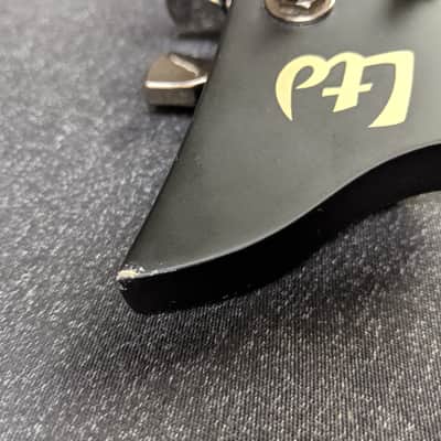 LTD Hex-7 Nergal Signature 7-String Electric Guitar Matte Black w/ Flying V Case image 13