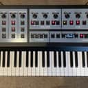 Oberheim OB-X8 61-Key 8-Voice Synthesizer 2022 - Present - Black with Wood Sides with NSP Flight Case