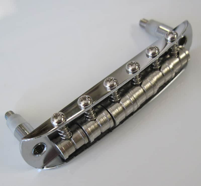 Fender USA Jaguar Jazzmaster Bridge with Mustang Saddles 7.25 Radius 7712971049 image 1