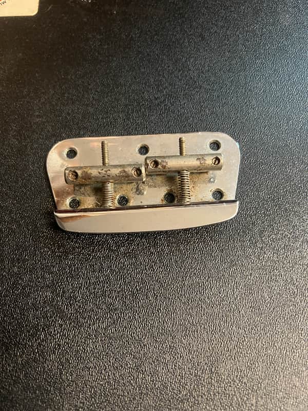 1977 Fender Vintage Musicmaster bridge & screws - chrome image 1