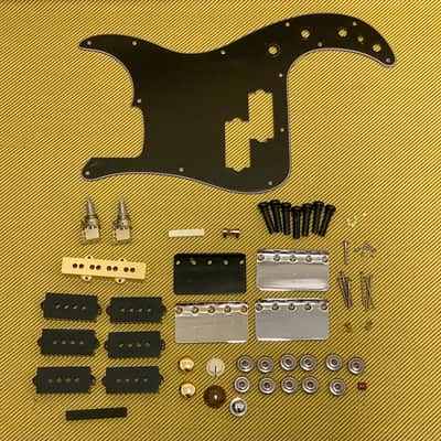 Assorted Bass Guitar Parts Lot P Bass Pickguard, Bridge Plates, Pickup Covers, String Guides, More