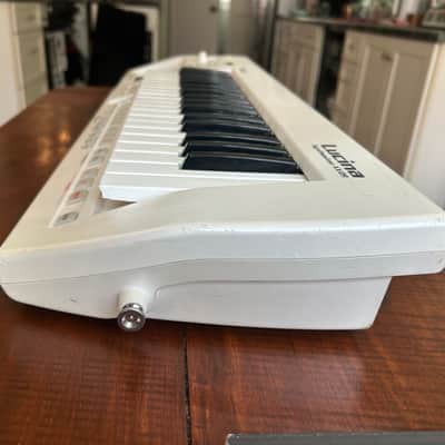 Roland AX-09 Lucina 37-Key Keytar Synthesizer Pearl White image 9