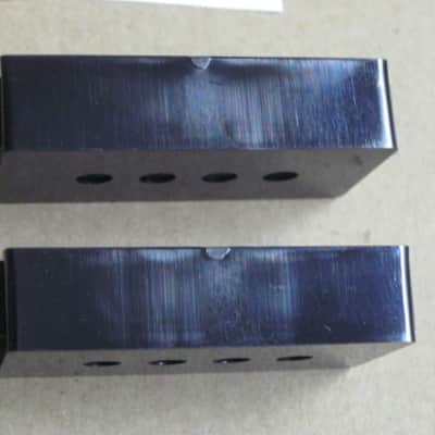 new + packaging (covers have some manufacturing imperfections) Allparts PC 0951-023 Black Pickup Cover Set (two individua covers) for Precision Bass / for P Bass - black, plastic, PC-0951-023 (never used, packaging opened to examine condition of covers) image 9