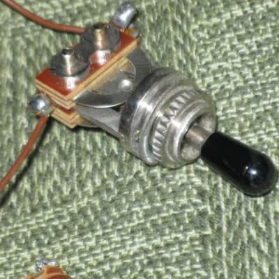 used 1997 Gibson control harness: 1 vol pot & 1 tone pot short shaft +nut/washer,wires,wire insualtion,capacitor,jack+nut/washer,switch +switch tip,nut +comes w/ new switch washer (NO other parts included) from The Hawk guitar (guitar NOT included) image 24