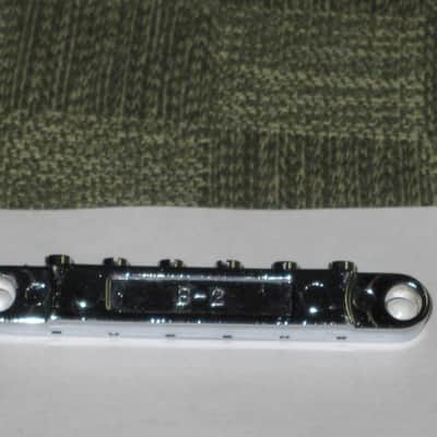 lightly used Epiphone B-2 metric ABR-1 vintage style bridge, wired,  CHROME, large posts mounting pieces (NO anchors) 1990s/2000s (for some import guitars that use this style bridge) will NOT fit on Gibson - mounting holes are too big image 3