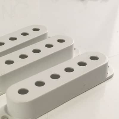 Genuine Fender Pure Vintage Strat Pickup Covers Vintage Light Relic White USA image 3