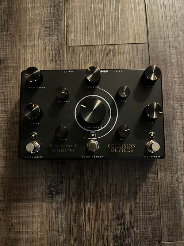 Collision Devices Black Hole Symmetry