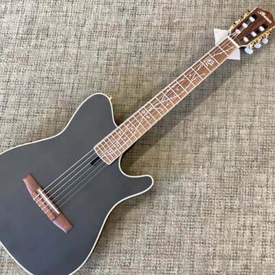 Ibanez TOD10N Tim Henson Signature in Transparent Black Flat image 1