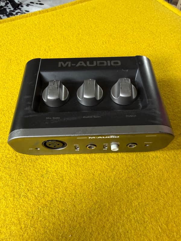 M-Audio Fast Track USB audio interface, ideal for basic home recording of vocals or guitar. Simple plug-and-play setup, compact design, and compatible with Mac/PC. image 1