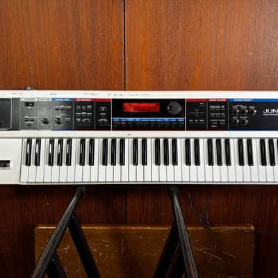 Roland Juno-Di Portable 61-key Mobile Synthesizer White color w/ bag power supply