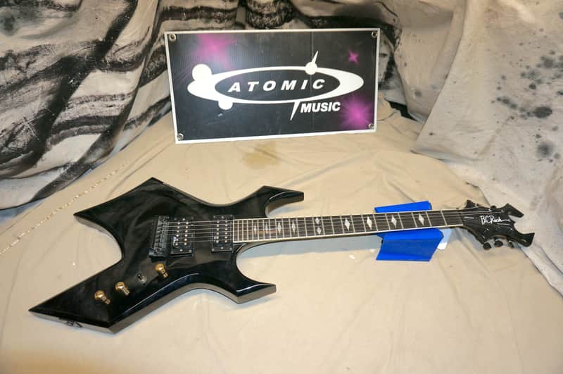 B.C. Rich Deluxe Series Warlock Guitar with Case Black BC Rich image 1