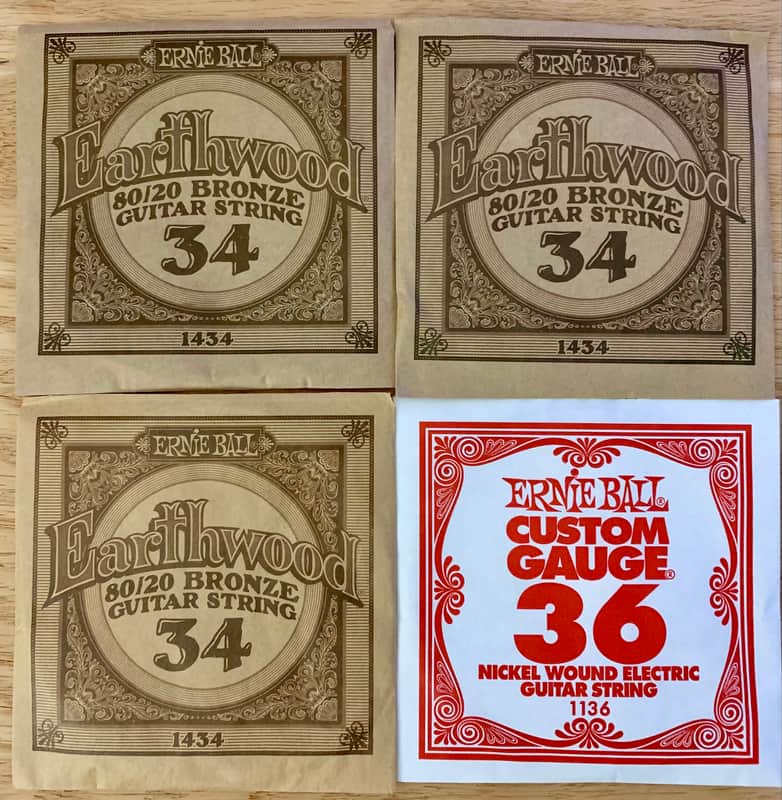 Four Single Guitar Strings - .034 and .036 Gauge (Ernie Ball) Opened, Not Played image 1