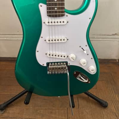 Custom Built 2026 guitar, Mahogany Body, Maple neck with laurel fingerboard. Metallic green body. Pro setup done play's great. Upgraded locking tuners, Matching Bridge image 3