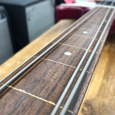 Peavey Milestone IV Fretless Bass Guitar - Transpartent Red image 12