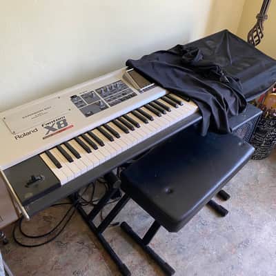 Roland Fantom-X8 88-Key Workstation Keyboard (includes stereo amp, stand, bench and pedal and keyboard cover))