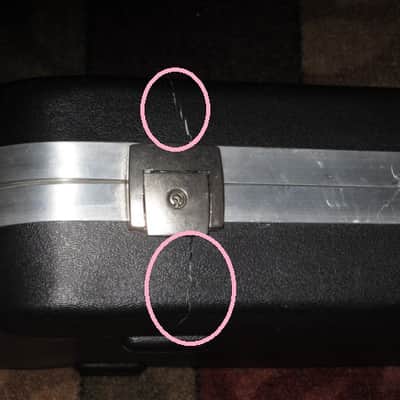 used Rickenbacker Hardshell Case for Model 620 electric guitar (NO guitar) from 1995, 2 Ball feet broke off (2 holes in plastic), Exterior plastic has some cracks,  EXT: Black Hard Plastic / Chrome HW / Handle: Black Molded Hard Plastic / INT: Blue Plush image 13