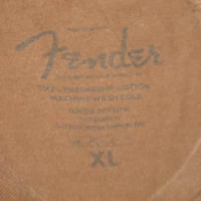 pre-owned genuine Fender Lightning Bolt Logo Short Sleeve, Cotton T-Shirt, XL, Brown (sleeves cut shorter) PN: 9101008621, from 2010, GRAPHIC: Red, Creme, Dark Brown, Fender, Ligntning Bolt, Circles, musical symbols, Electric Instrument Company Since 1946 image 3