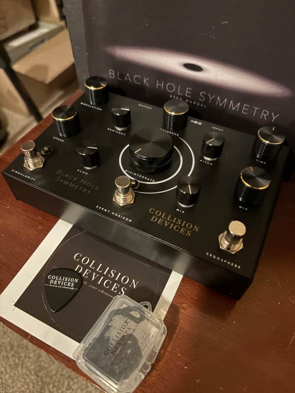 Collision Devices Black Hole Symmetry