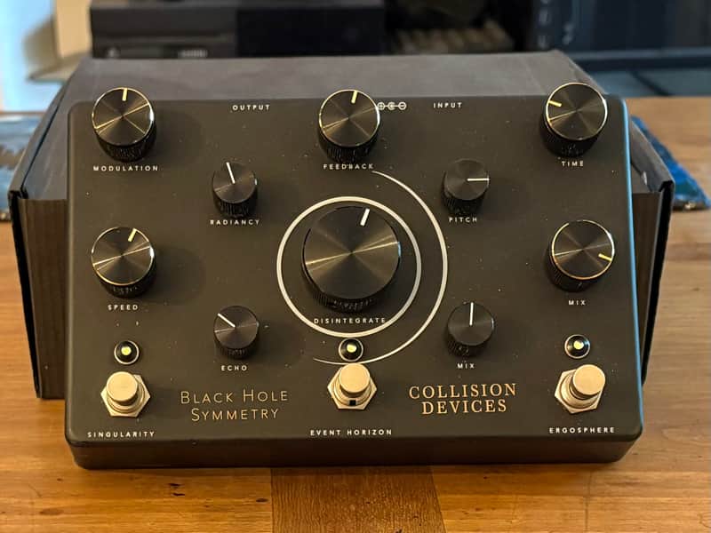 Collision Devices Black Hole Symmetry
