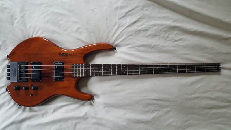 Hohner The Jack Natural Walnut Gloss, 24 frets, Headless, Steinberger Bridge, EMG Active pickups + X image 1