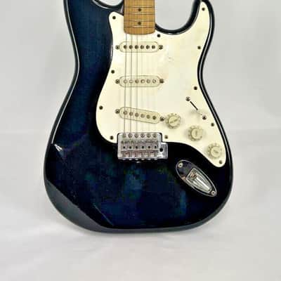 1994 Fender Squier Stratocaster Black good condition w/Gig bag image 1