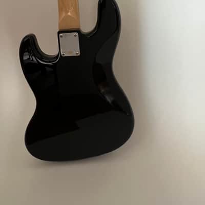 Austin AJB300BK Bass Electric Guitar 4 String Righthand Double Cut-A-Way AJB300BK Vintage Bass Black Solid Body image 7