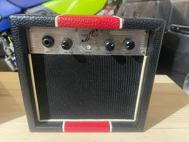 First Act Guitar amp Black and red image 1