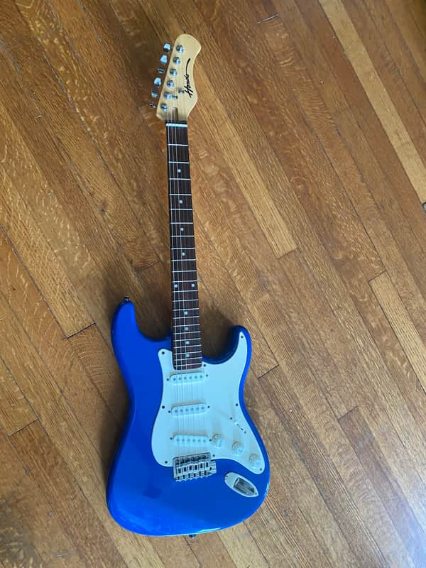 Bright blue Hondo Stratocaster electric guitar image 1