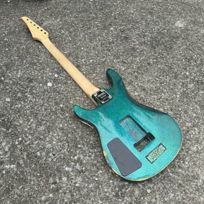 Sidewalk Sale: Washburn Mercury Series Electric Guitar Husk (1990s - Teal Flake) image 12
