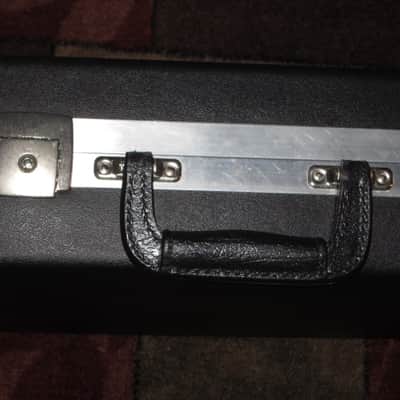 used Rickenbacker Hardshell Case for Model 620 electric guitar (NO guitar) from 1995, 2 Ball feet broke off (2 holes in plastic), Exterior plastic has some cracks,  EXT: Black Hard Plastic / Chrome HW / Handle: Black Molded Hard Plastic / INT: Blue Plush image 16