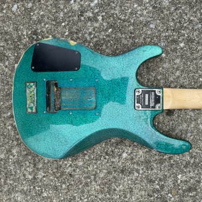 Sidewalk Sale: Washburn Mercury Series Electric Guitar Husk (1990s - Teal Flake) image 8