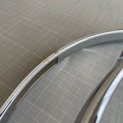 A set of Tama 13” 8-hole steel snare hoops image 2