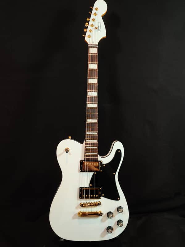 Back in Stock: The Iconic Olympic White Telecaster Deluxe with Double Humbuckers - Professionally Set Up for Unparalleled Sound" image 1